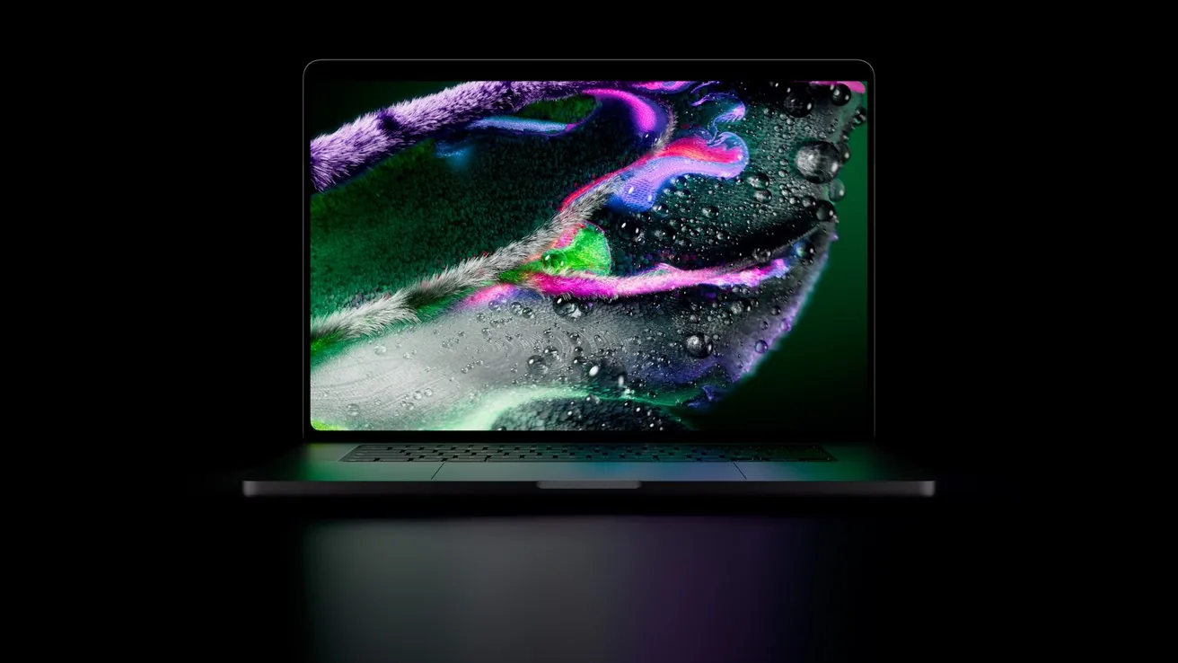 The MacBook Pro with PROLED XDR Display open on a dark background, its OLED screen showing a vivid abstract image.